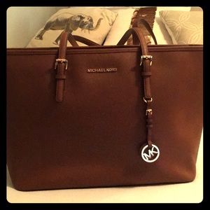 Brown Michael Kors medium jet set travel bag